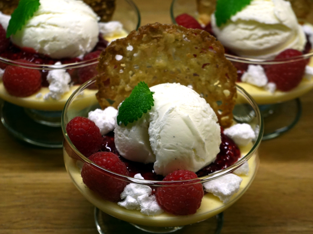 Lemon mousse with raspberry sauce and oat flakes thumbnail #0